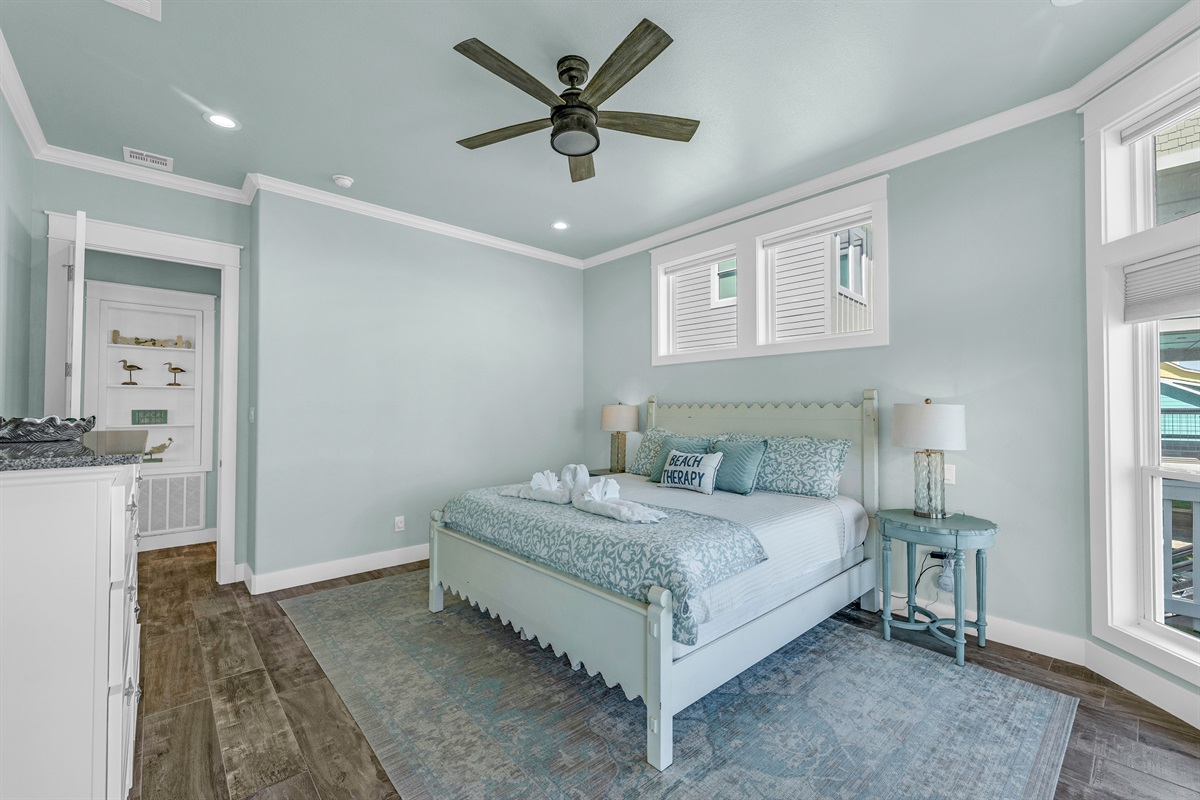 Crystal Paradise Primary Bedroom: Wake up refreshed in the elegant primary bedroom with a king bed on the main level.