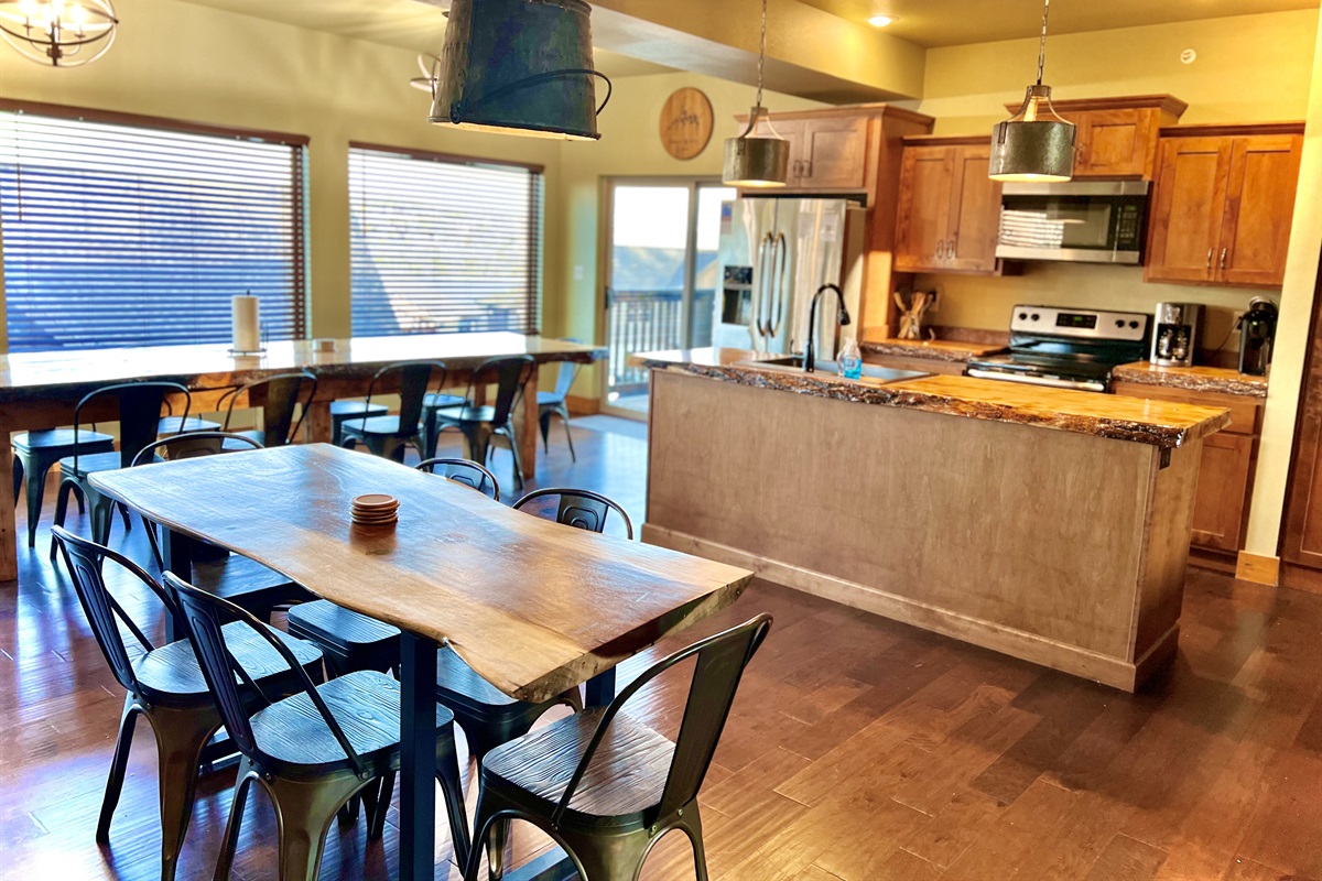 Large, open dining space with enormous windows and spectacular lighting!