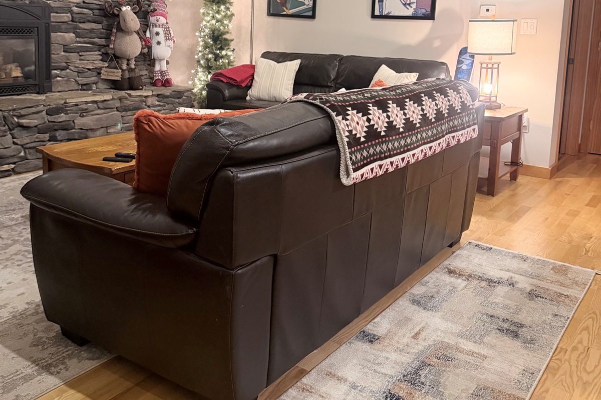 Get comfortable relaxing by the fire and Christmas decor 