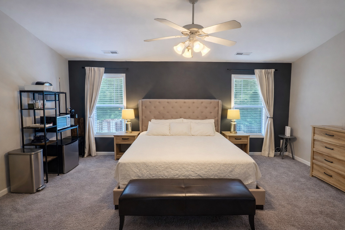 Spacious King Suite with kitchenette, desk, walk-in closet, and large bathroom