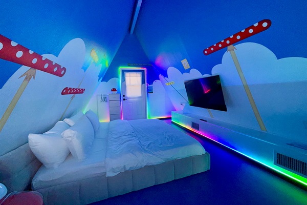 King-size bed with a private smart TV (and your own entrance).