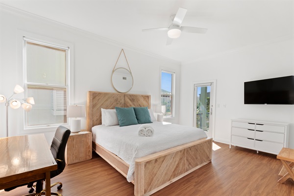 Master bedroom includes a massive King bed with a bit of office space if needed.