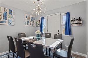 Share delicious dishes with loved ones at the 8-seater dining table.