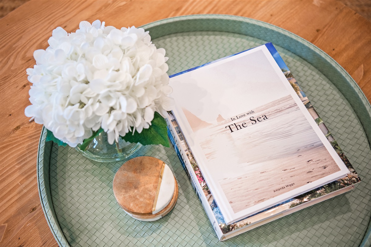 Thoughtful decor and coastal charm create a warm, inviting vibe in our main living area.