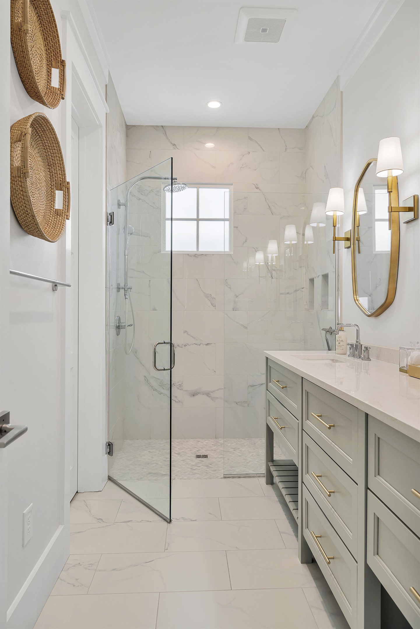 Queen bedroom ensuite, featuring a double vanity and walk-in shower.