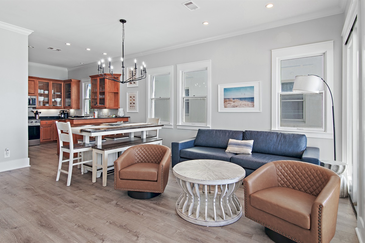 Frangista Sunset's Open Living space with Gulf Views, comfortable seating in the living room, dining room, and kitchen!