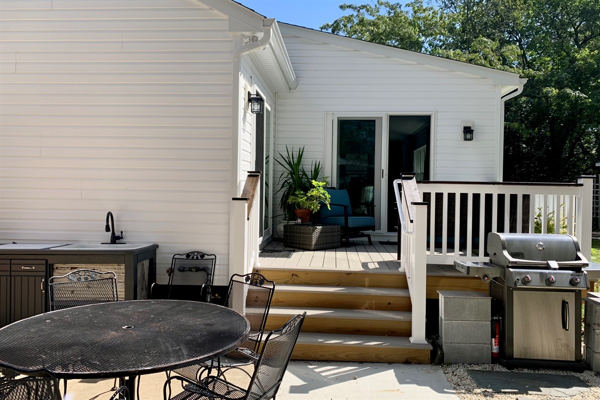 There's a natural gas grill as well as an outdoor sink and prep station for you to get your grill on