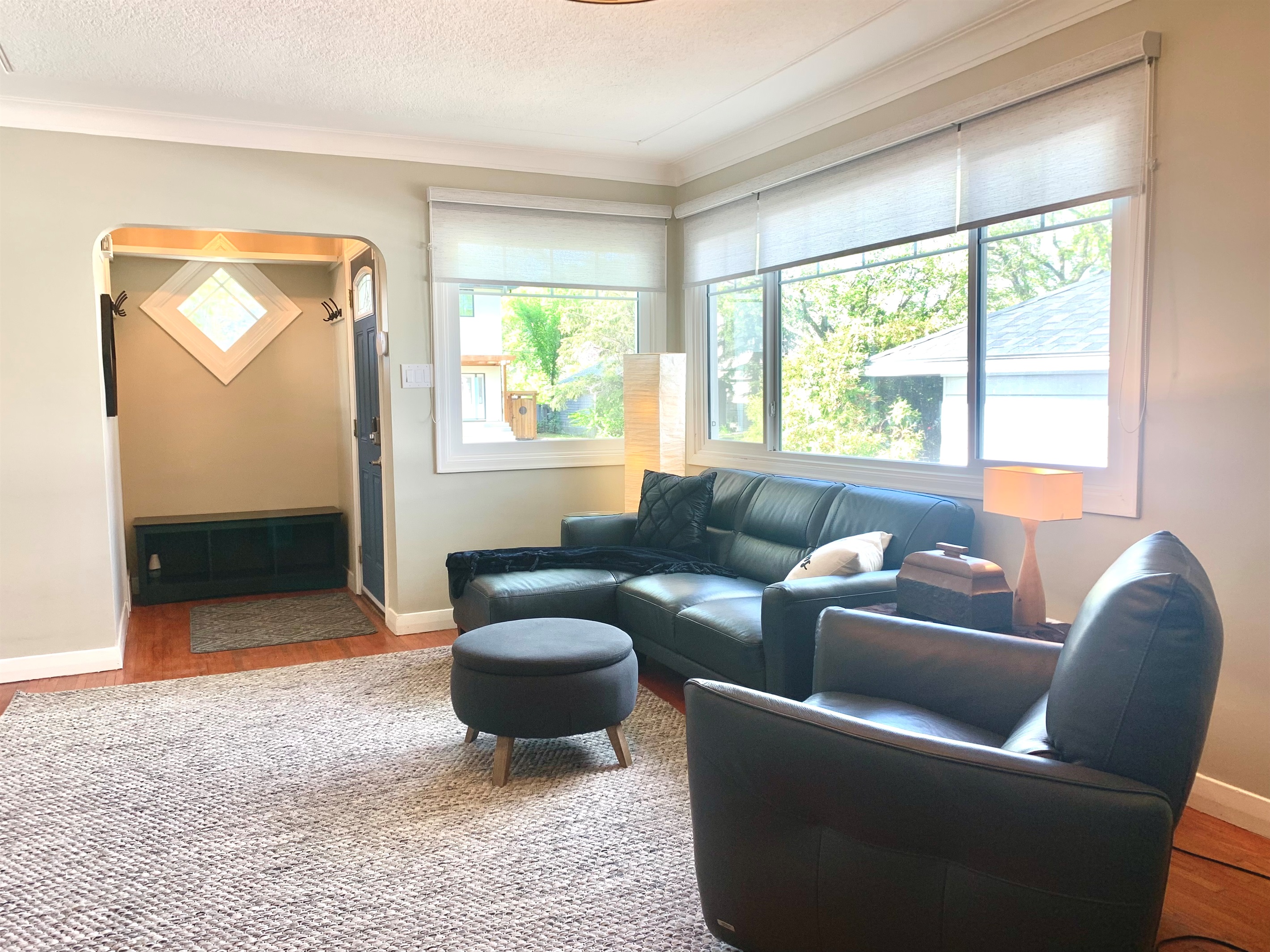 Lounge Area with Smart TV · Quality furnishings including an electric recliner.