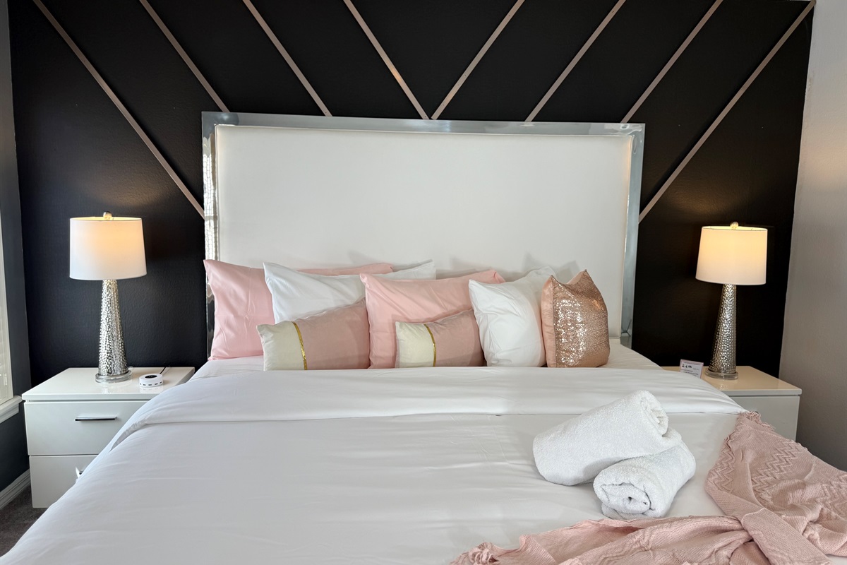 ✨ Sleep like royalty in our king bedroom retreat with a pillow-top mattress, plush linens, and a 50” Smart TV