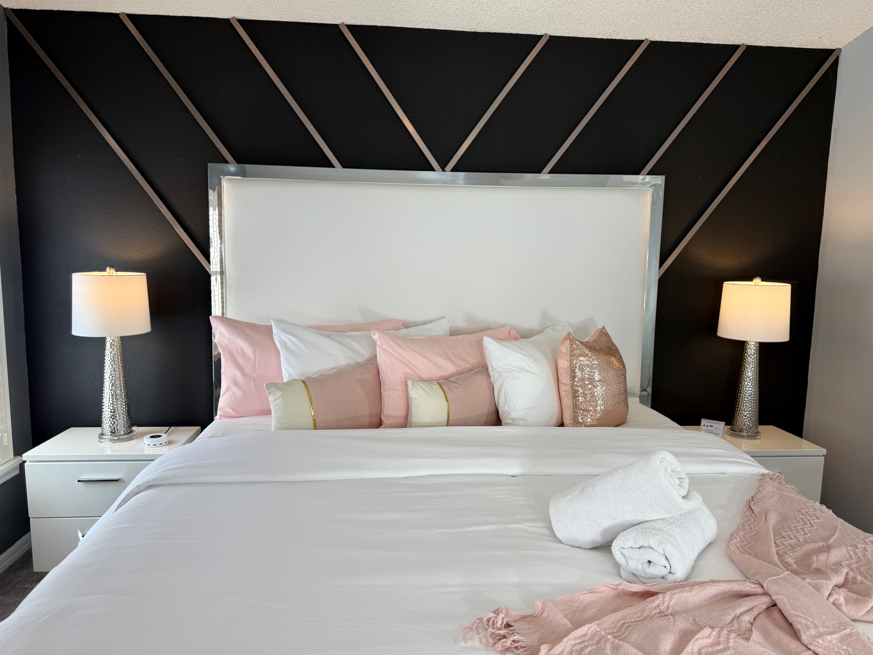 ✨ Sleep like royalty in our king bedroom retreat with a pillow-top mattress, plush linens, and a 50” Smart TV