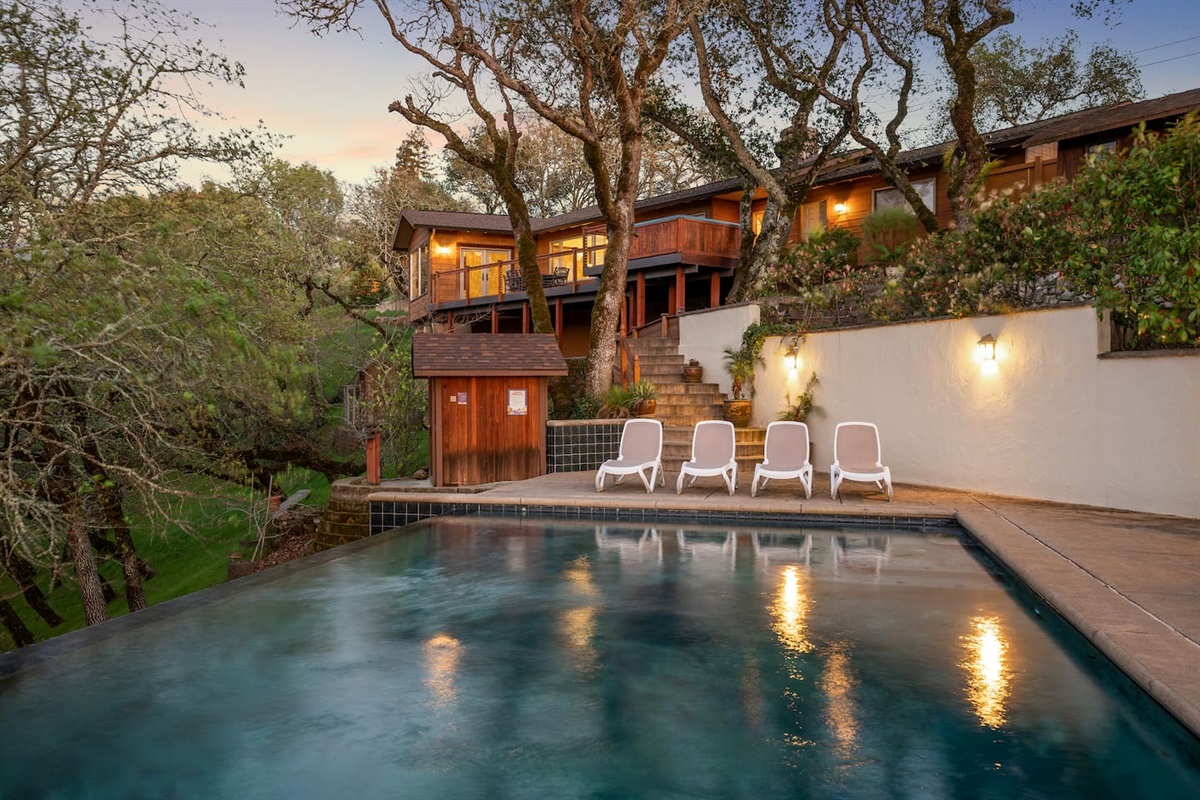 Large saltwater infinity pool. Gas-heated to be comfortable all year. 8 pool loungers and a giant bin of pool noodles are provided on the pool deck.