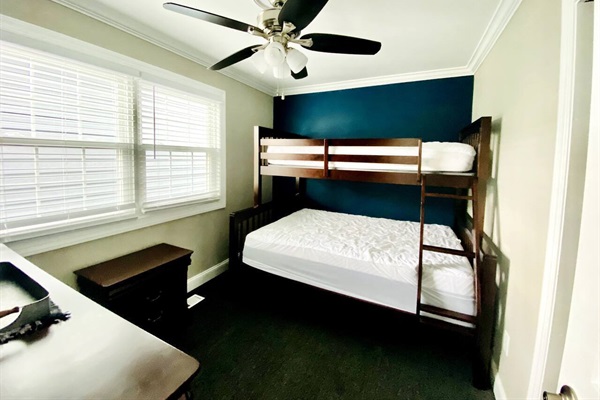 First floor bedroom with Full and twin bunk beds.