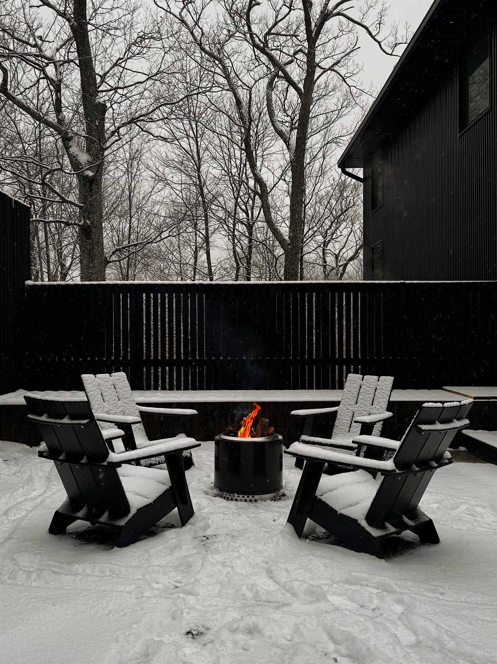Solo fire pit and modern Adirondack chairs from DWR.