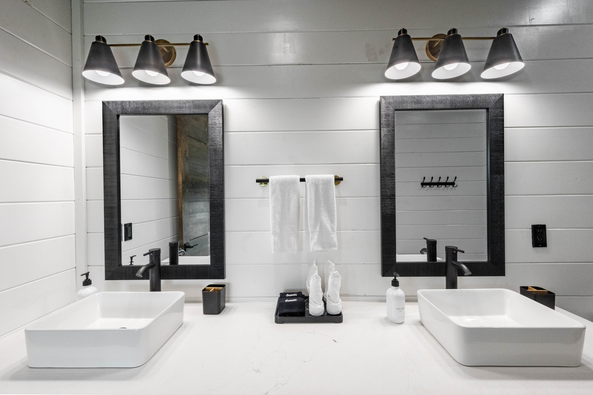 Enjoy spa-like experience in our modern bathroom featuring a spacious double vanity, stylish finishes and thoughtful amenities for your comfort and convenience