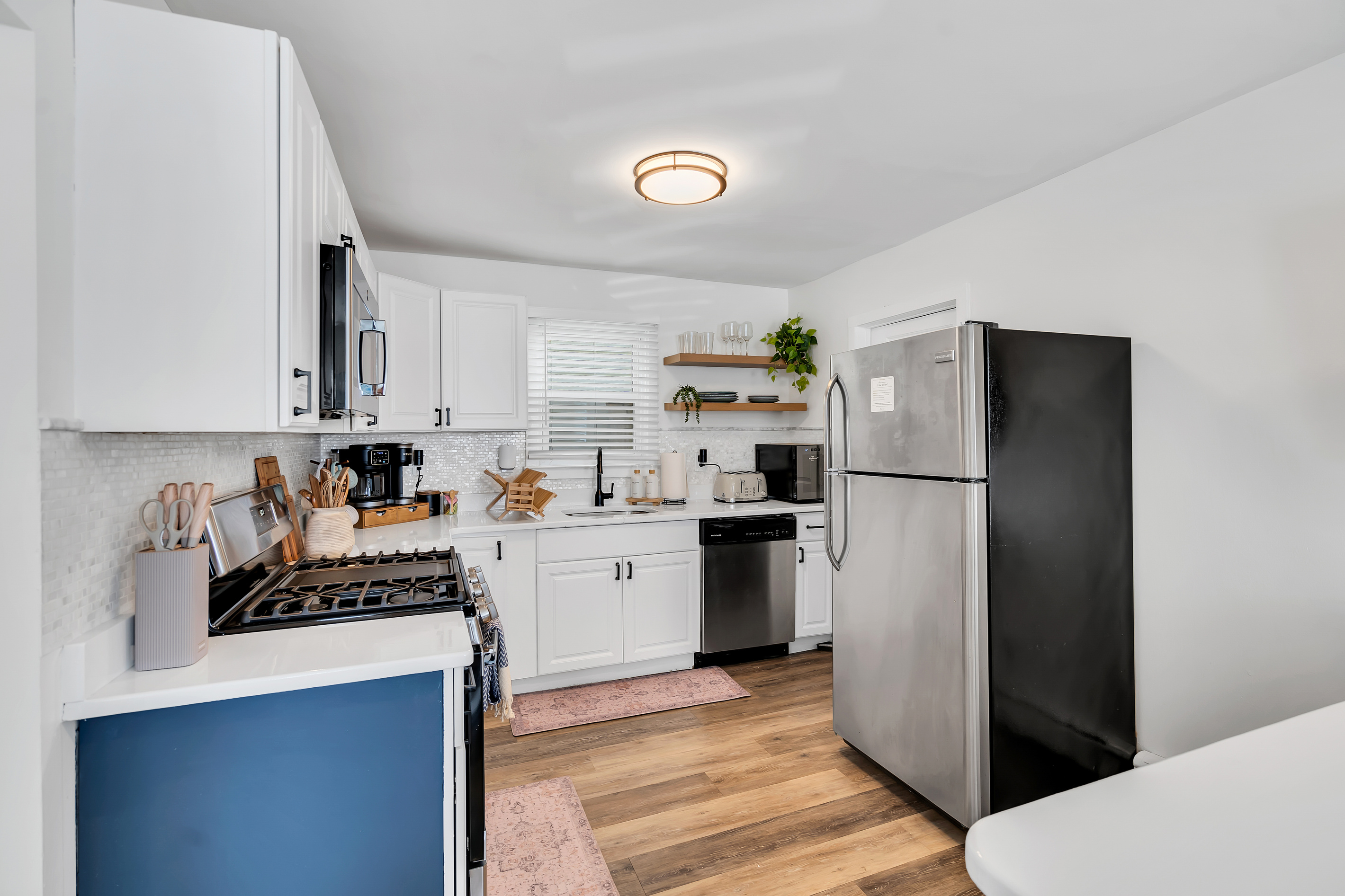 Pour the wine and prep dinner at the navy island. This little kitchen punches well above its size, fully stocked with pots, pans, and everything you reach for.