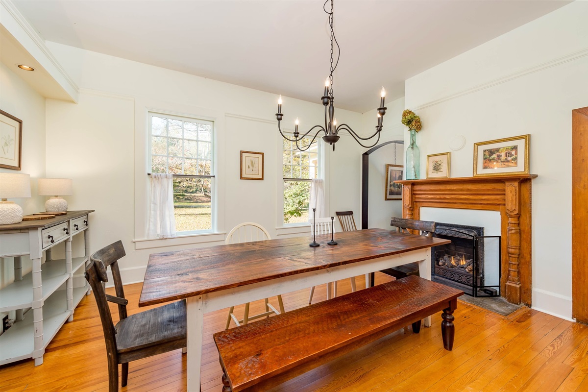 Large farmtable for shared meals and laughter. Firelogs complete the ambiance