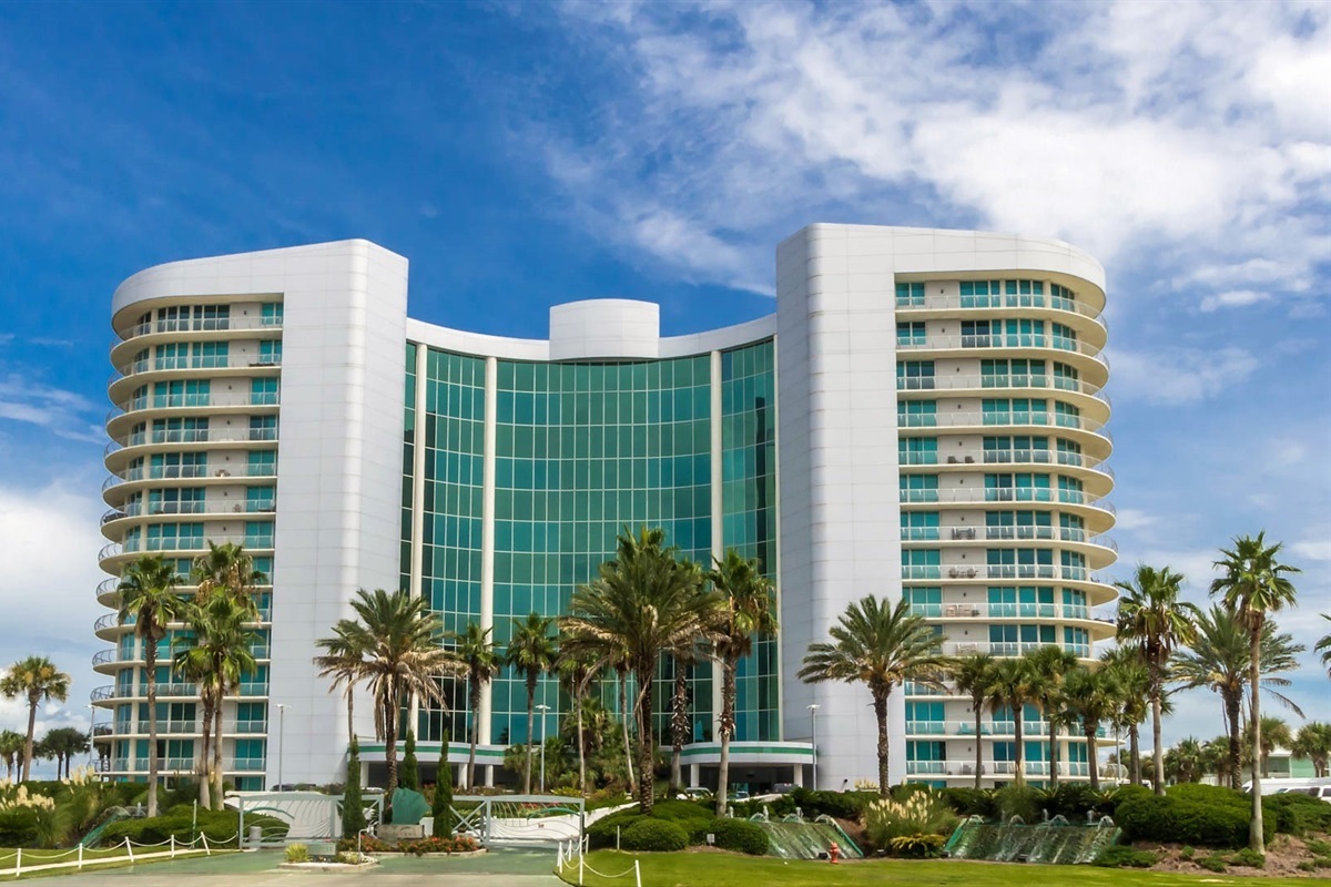 Capturing the essence of upscale bayfront living, framed by iconic palm trees and bathed in natural light.