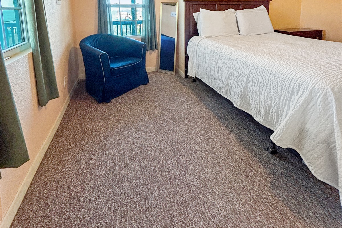 Queen bed in master bedroom