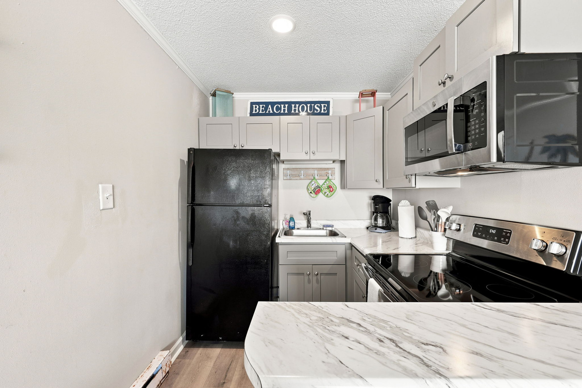 A well-appointed kitchen with ample counter space, essential cookware, and thoughtful touches to make your stay feel effortless