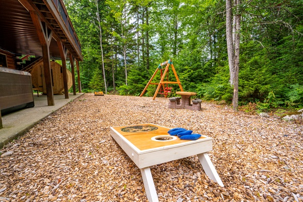 Easy outdoor fun with classic cornhole boards on site.