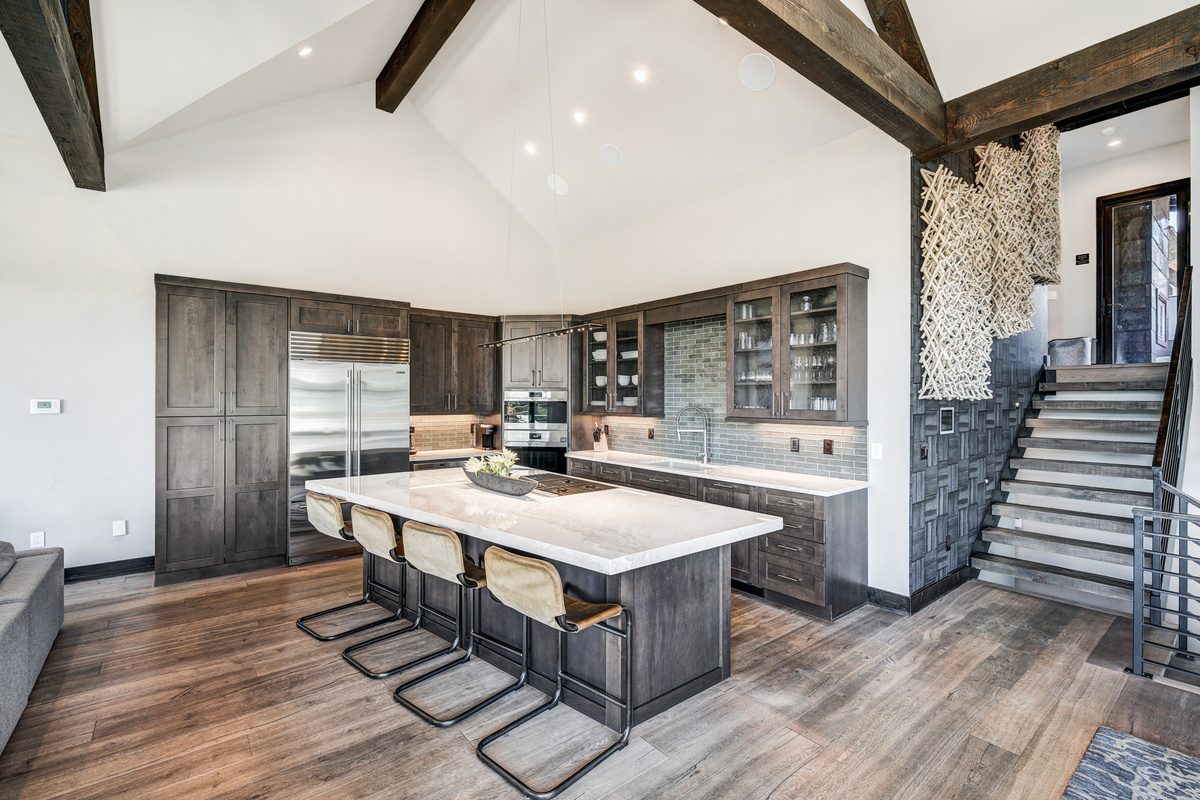 Kitchen with open floor plan to dining room and living room.