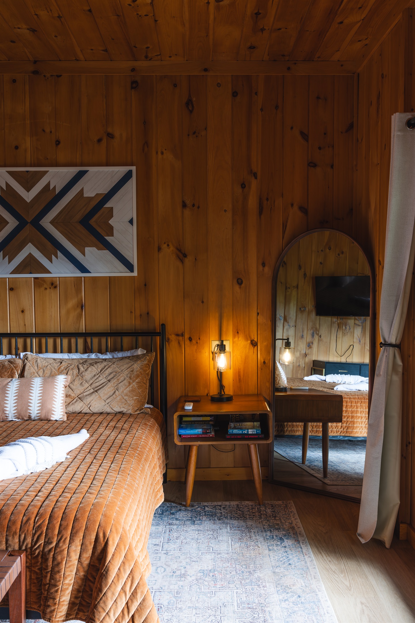 The Lower-Level King Bedroom is thoughtfully stocked with reading books and easy-access USB charging outlets, making it easy to unwind with a good story while keeping your devices powered and within reach.