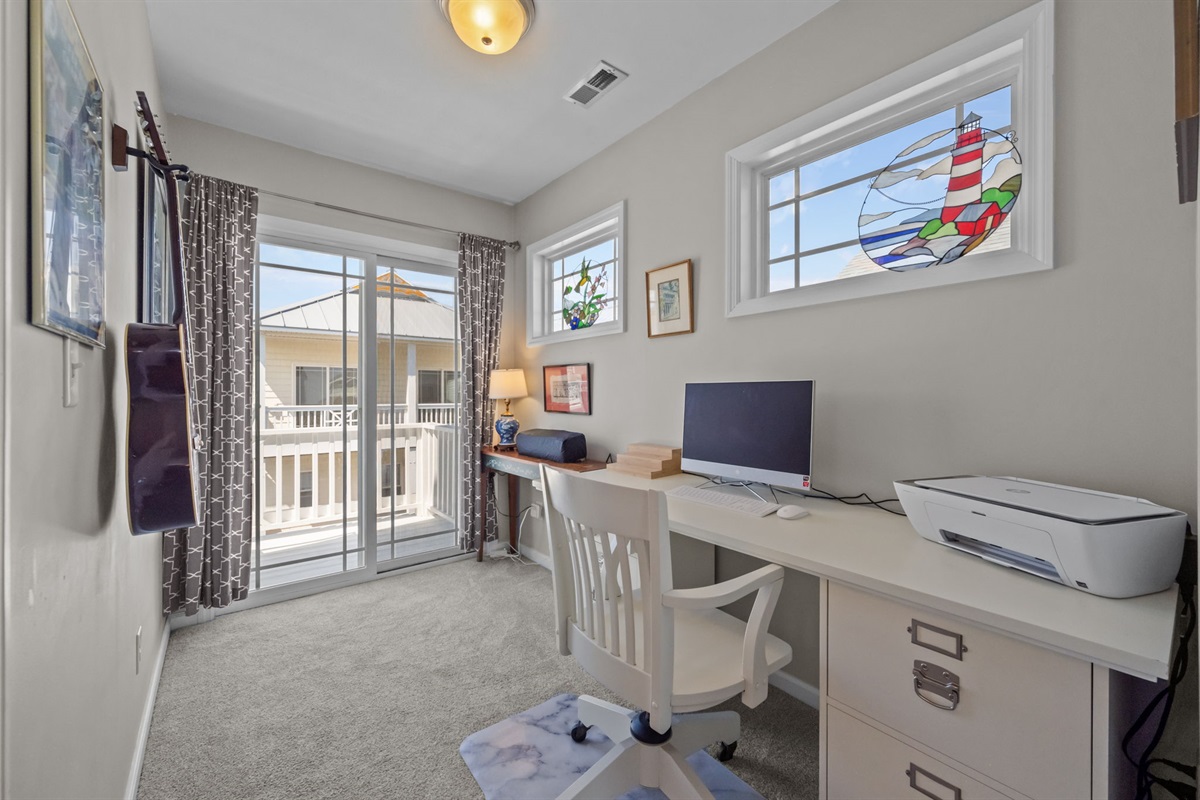 Dedicated workspace in master bedroom, full of natural light!