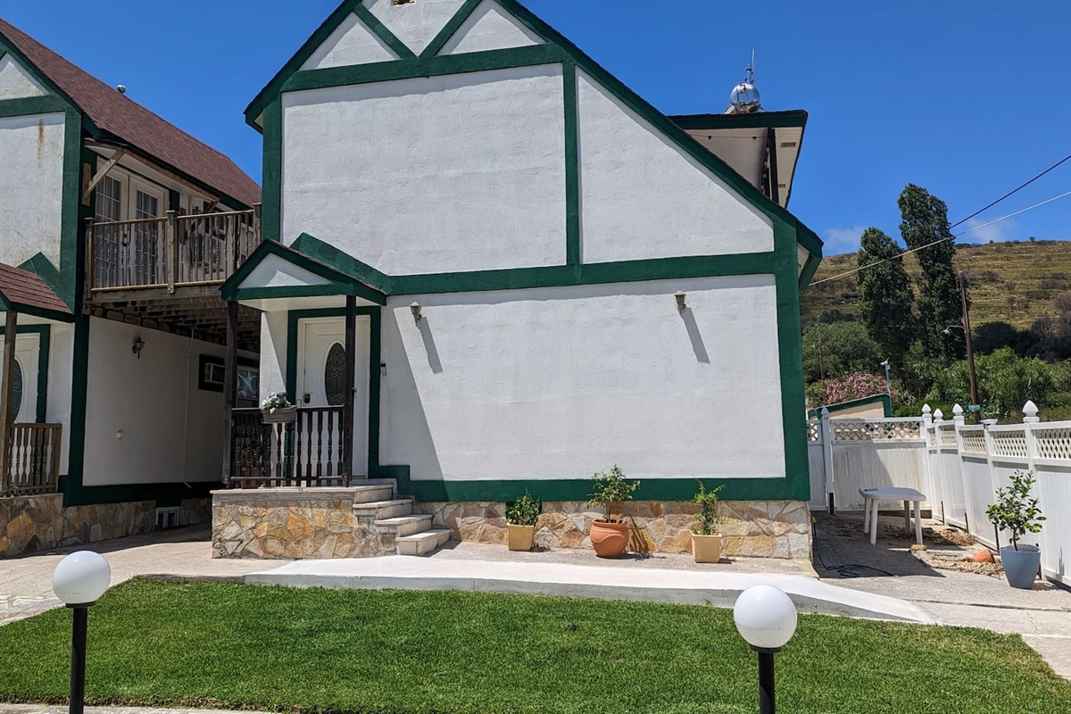 The exterior entrance, home on the right. 