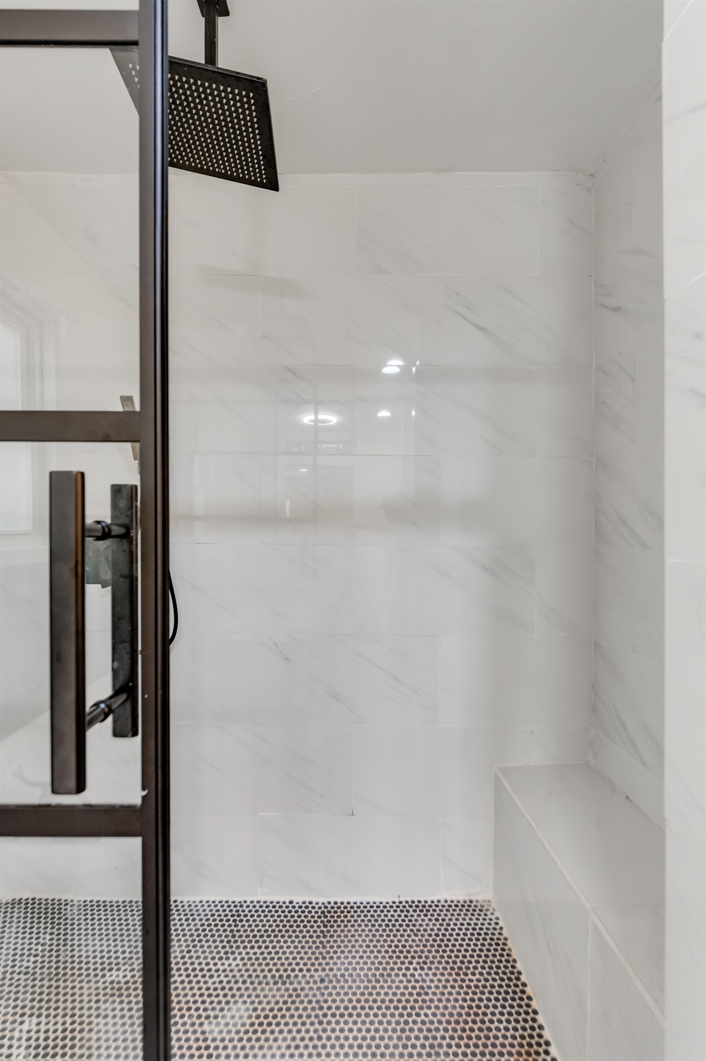Upstairs Ensuite Full Bathroom 2: Experience luxury with a spacious walk-in shower and elegant marble tiles!