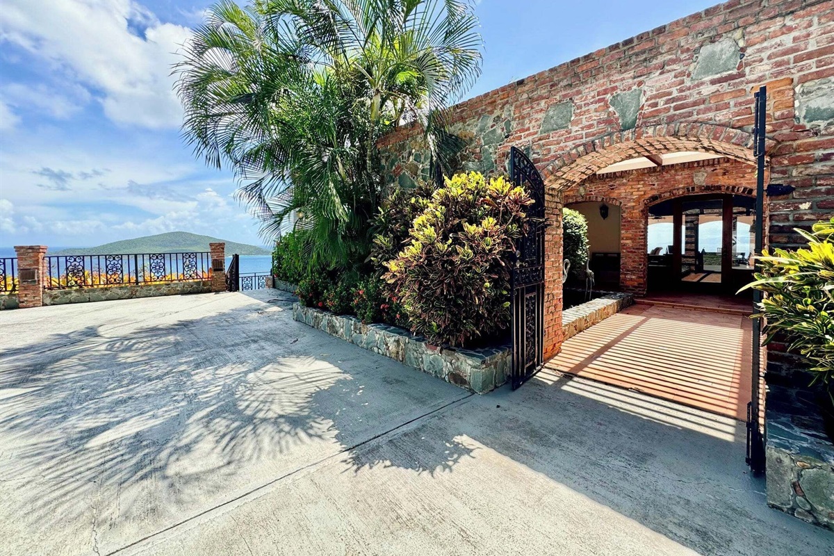 Step outside, through the gorgeous entry way and walk to the right, you will find the staircase that leads to the downstairs apartment and fourth bedroom.