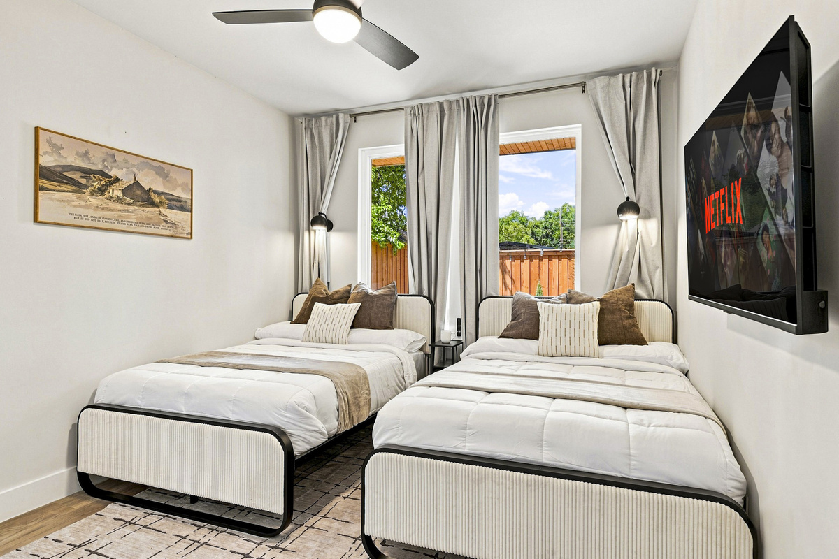 Relax in twin beds with stylish decor and streaming entertainment!