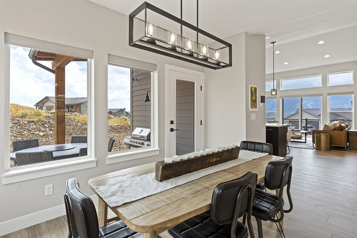 ining area with large windows and open views into the great room