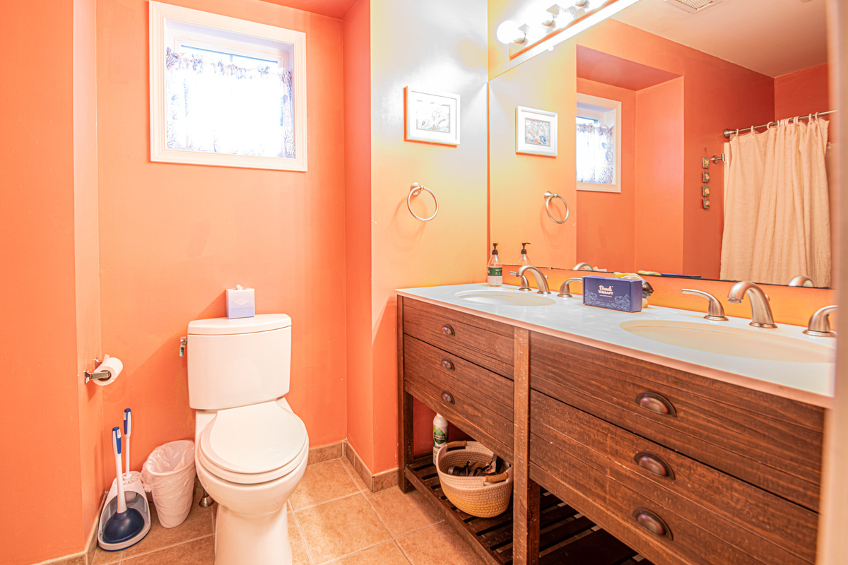 Bathroom 2 with Double Vanity and Toilet