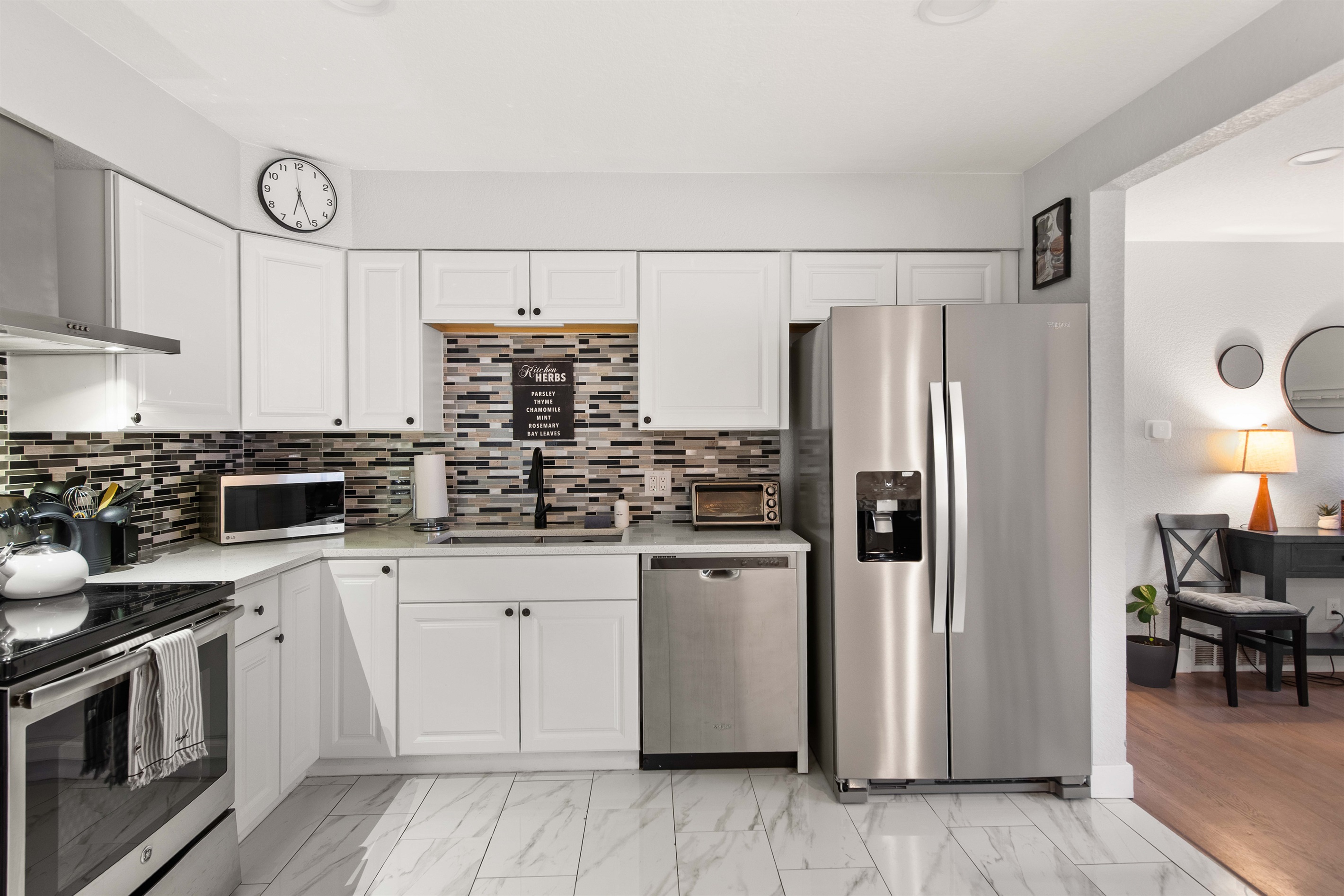 Modern kitchen with stainless appliances and ample counter space
