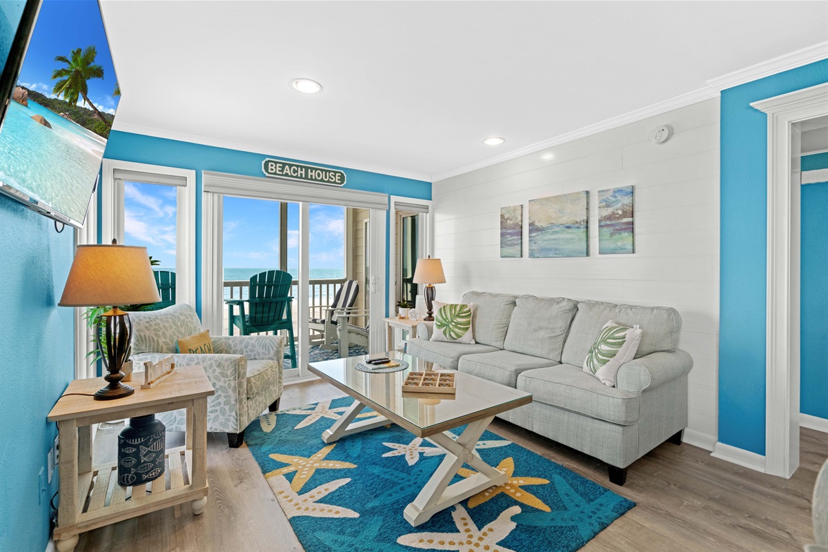 Living room with plenty of seating and ocean views