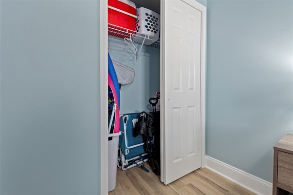 Guest closet where we store beach wagon, beach chairs and some extras for you to use.