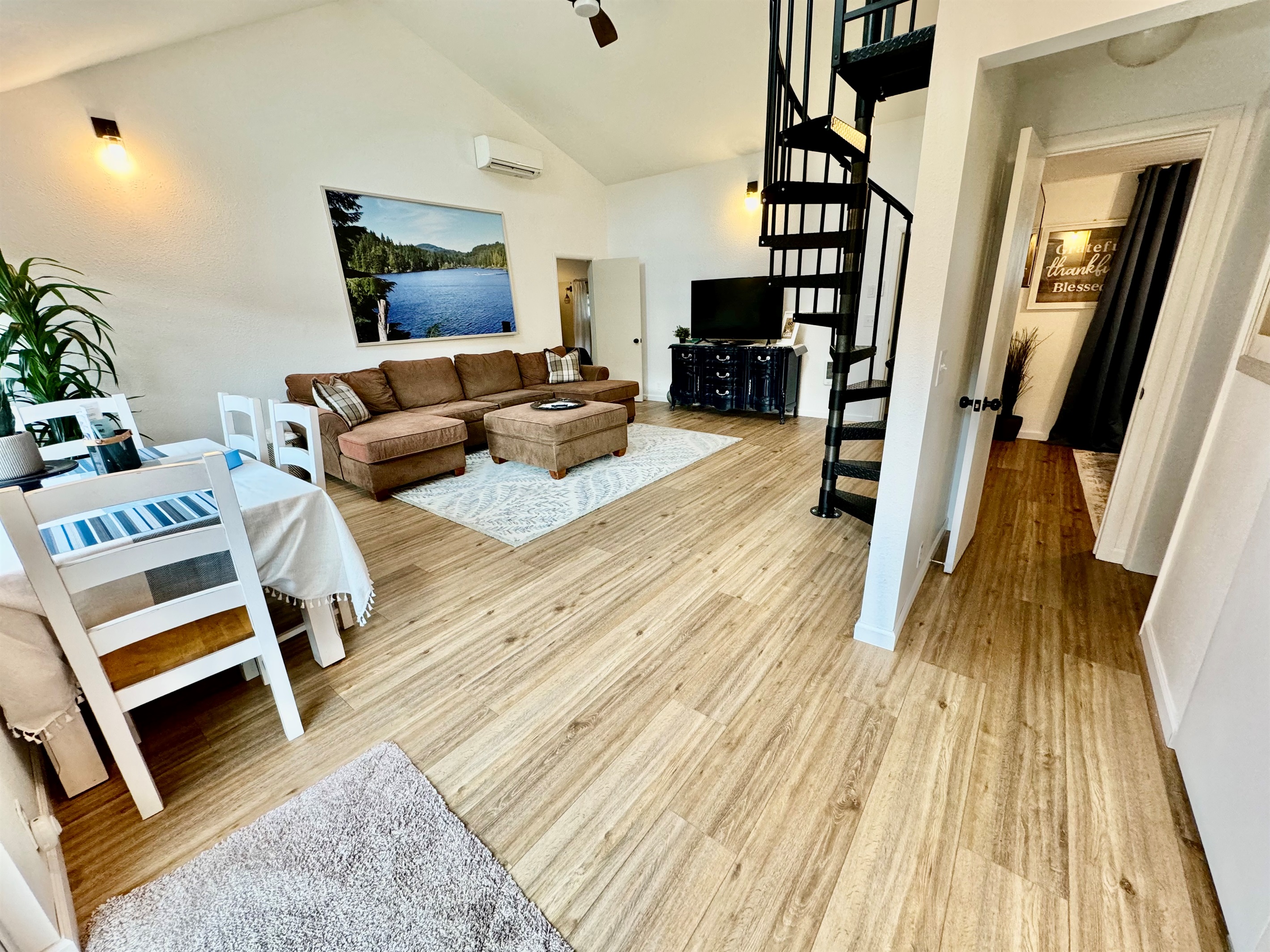 dining area, Living room, hallway to bath & queen bedroom - stairs to loft
