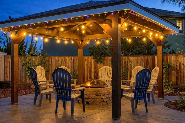 Fire pit seating under gazebo – perfect for evenings together
