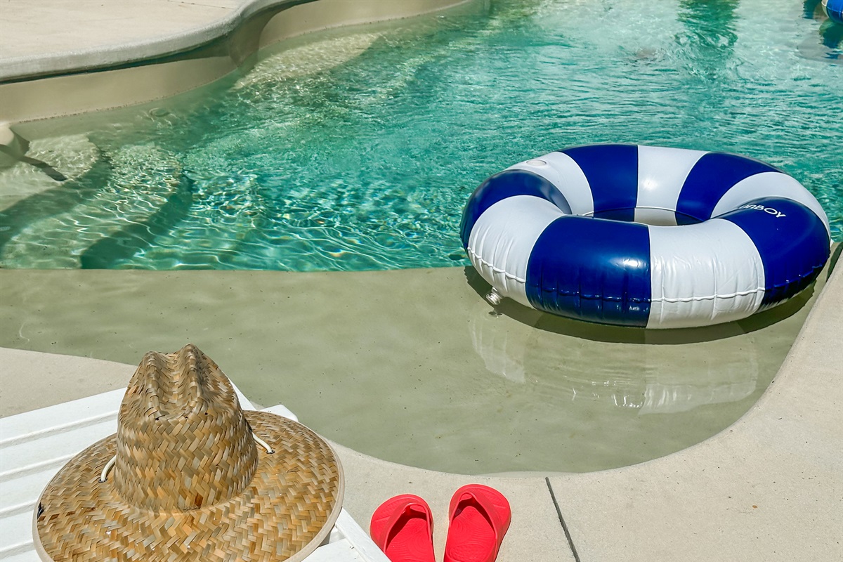 Sunbathe in the private backyard and swim in the pool.