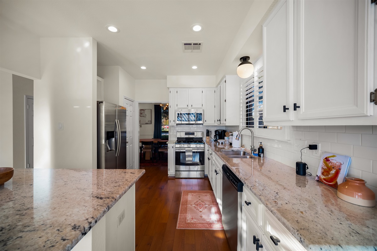 Updated kitchen seamlessly linked to a welcoming dining room