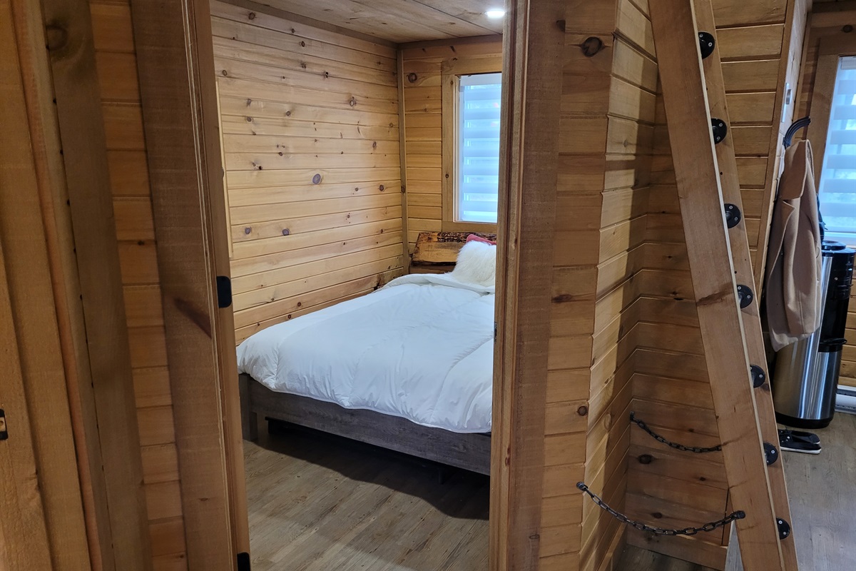 View of bedroom from doorway to bedroom