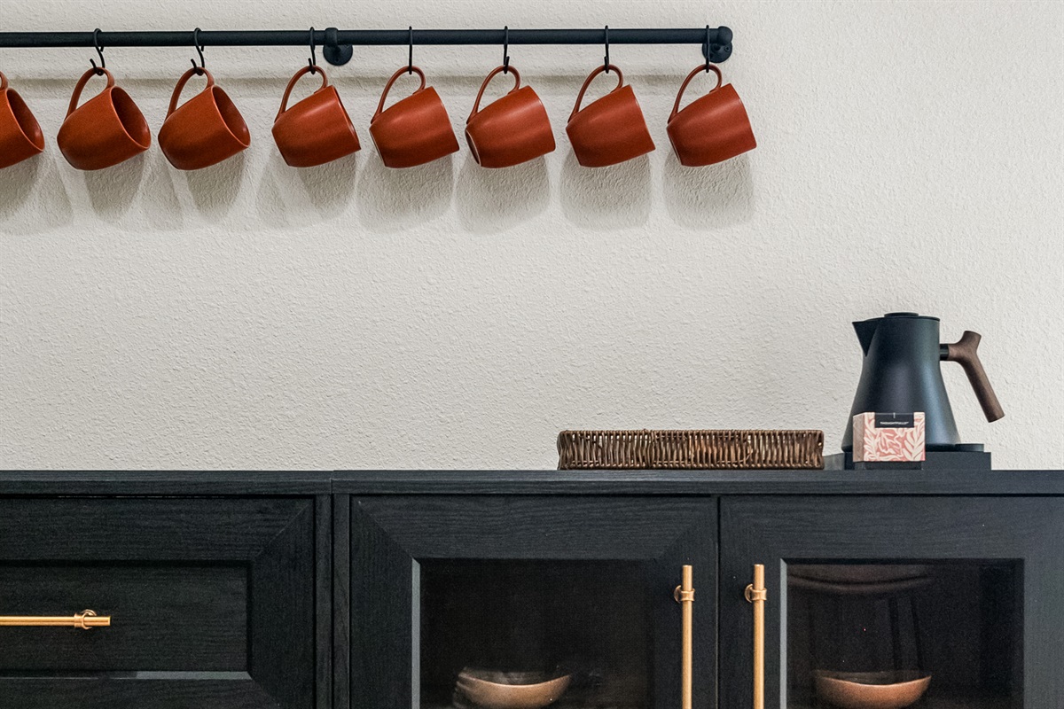 A coffee and tea bar features high-end Fellow kettle, brewer, and grinder with local gourmet coffee and Smith's tea provided