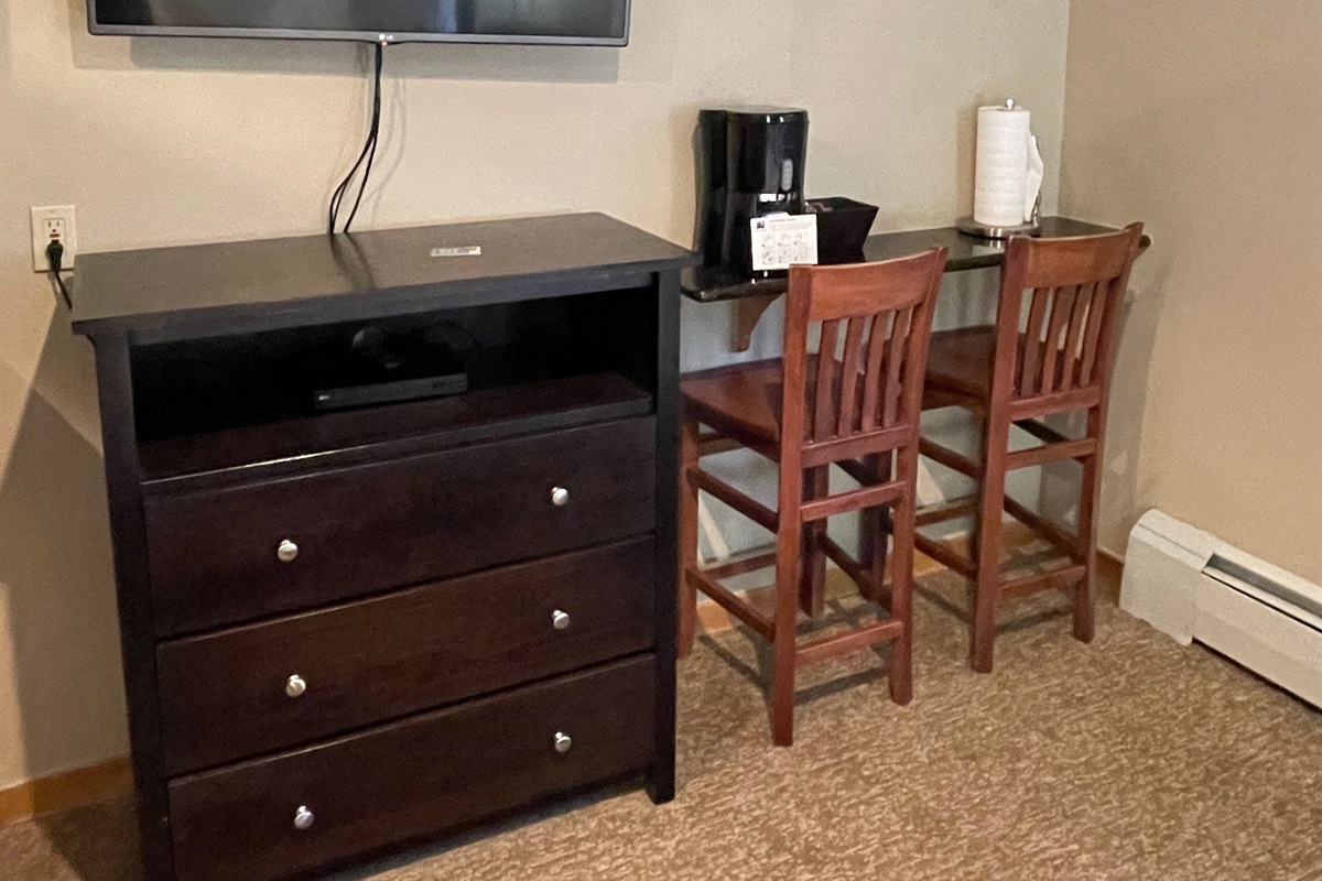 TV with small dining area