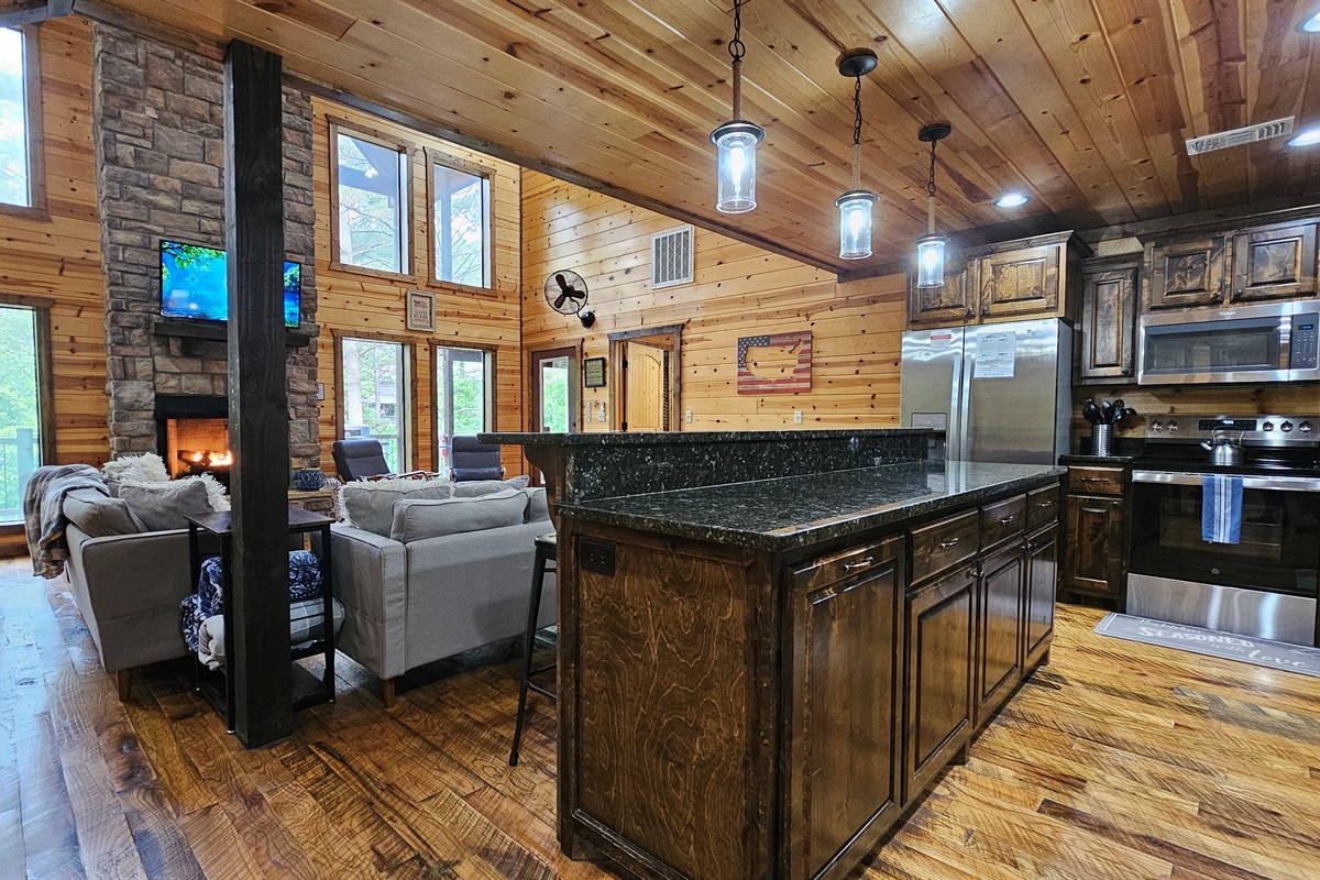 Living Room: Sun-drenched retreat with rustic charm and stunning nature views! Perfect for unwinding.