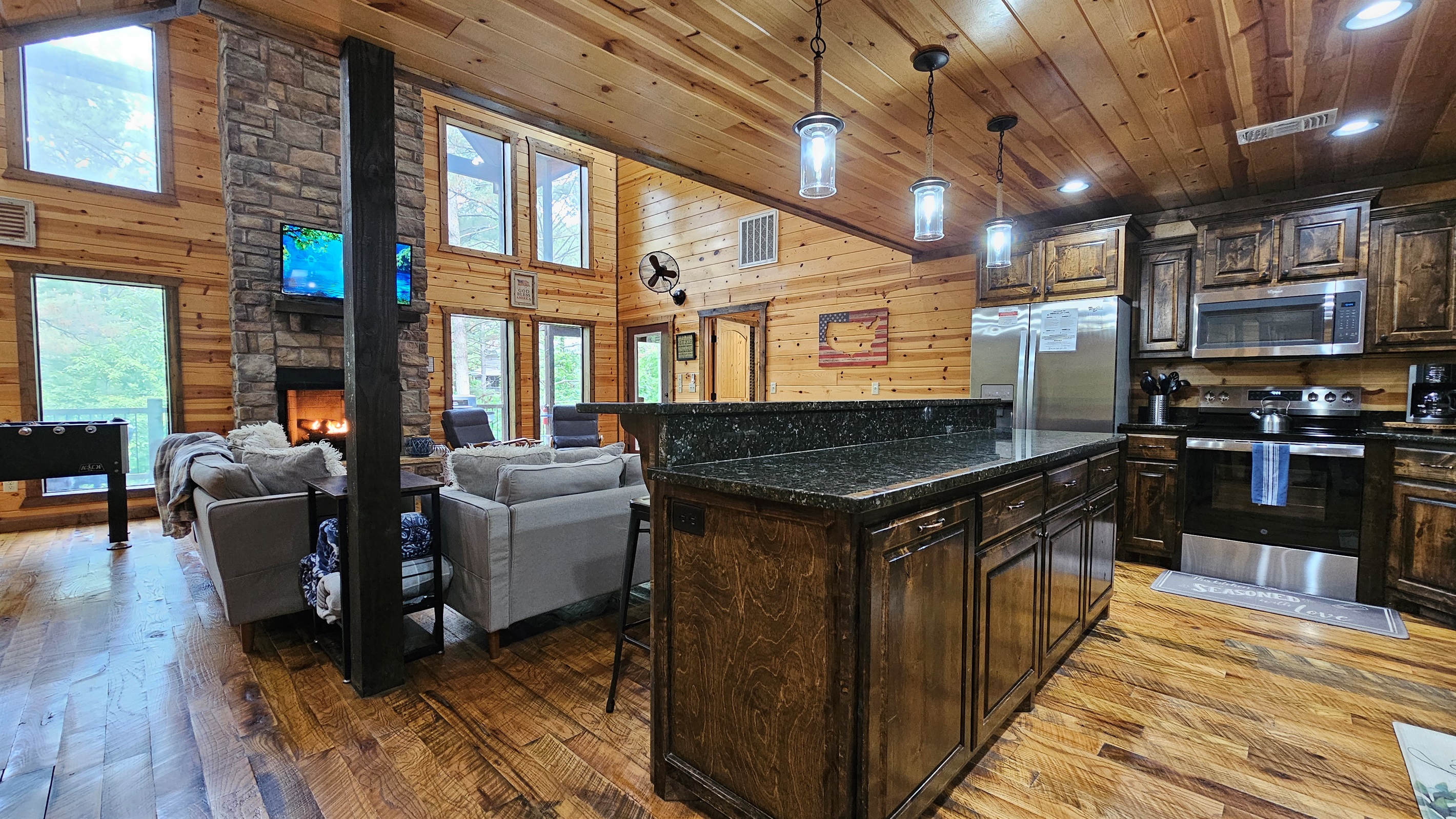 Living Room: Sun-drenched retreat with rustic charm and stunning nature views! Perfect for unwinding.