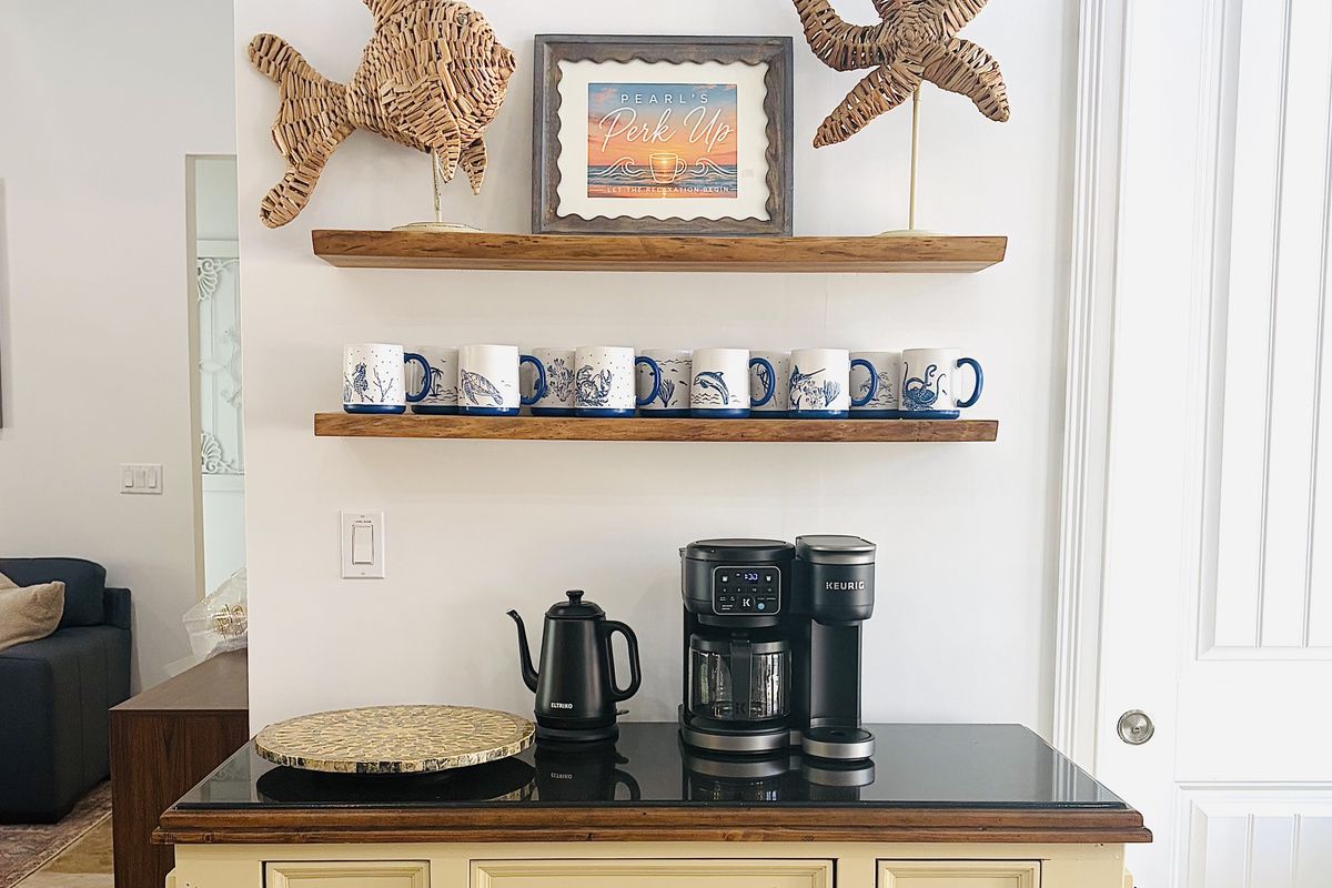 Full-service coffee bar with a tea kettle, regular coffee pot and a Keurig so everyone is covered and can make their brew how they like it. 