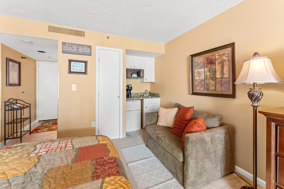 Studio with 2 queen beds, kitchenette with fridge and microwave and private balcony