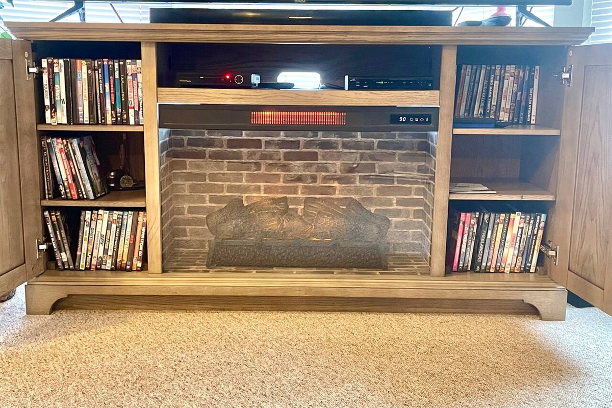 70” smartv with cable tv, dvd player and electric fireplace.
