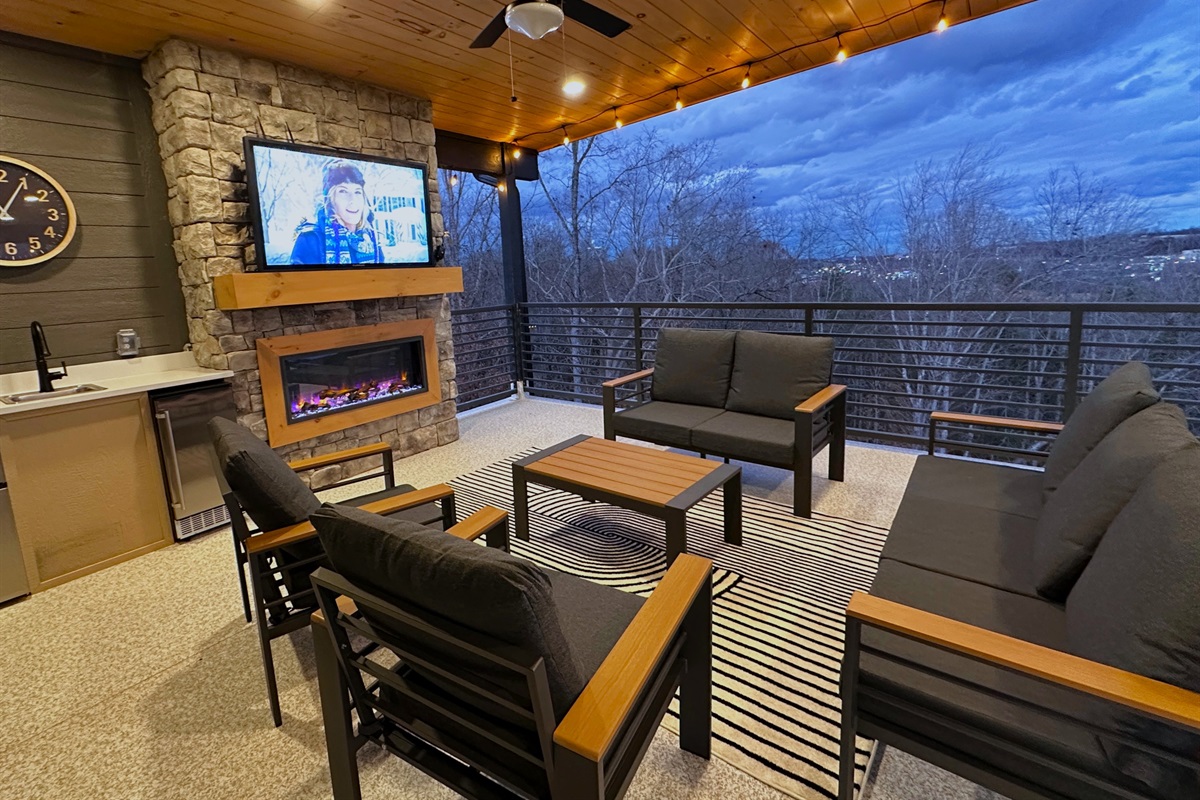 Floor 4 - Rooftop Deck: Fireplace + Movie Area