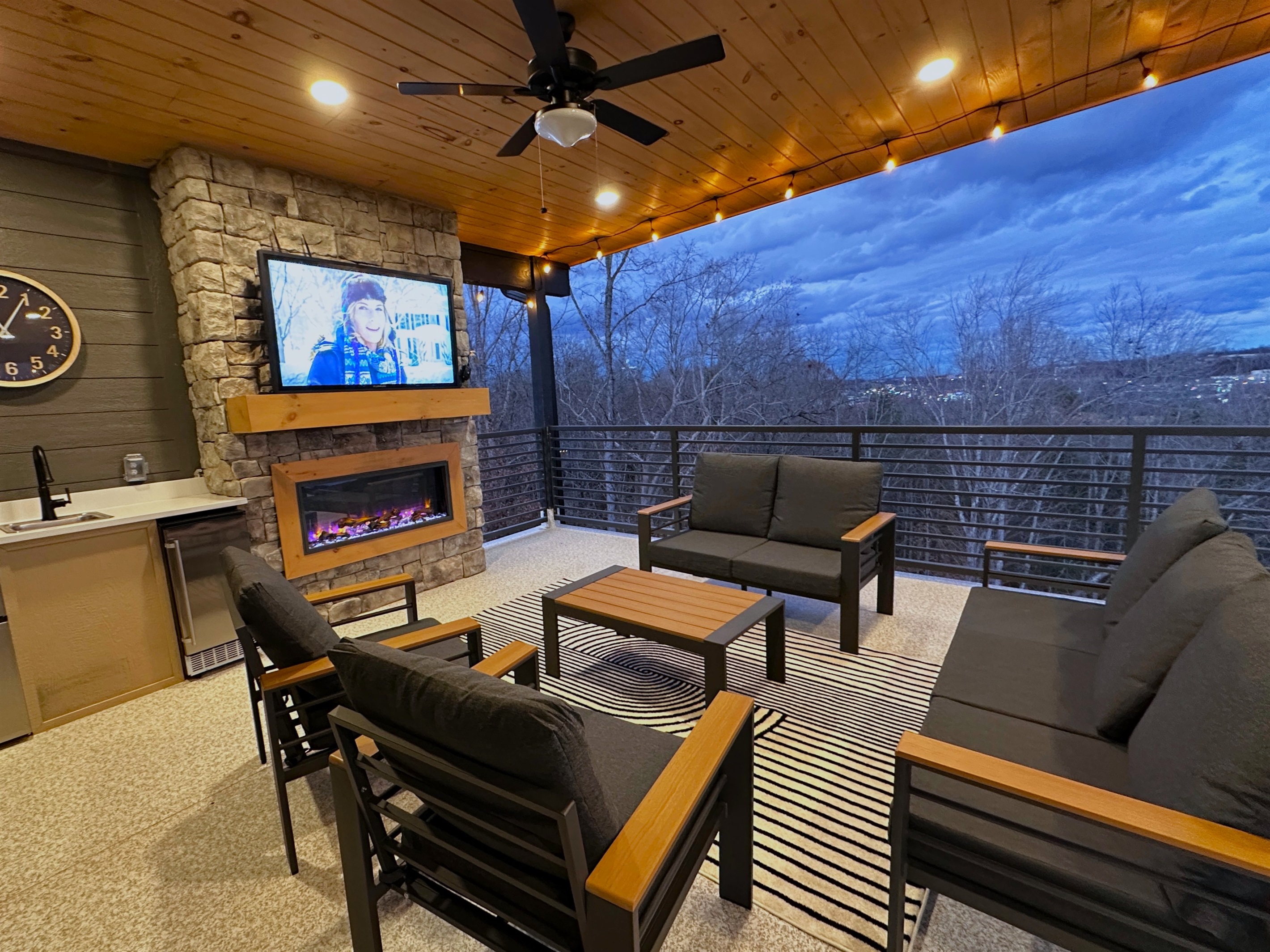 Floor 4 - Rooftop Deck: Fireplace + Movie Area
